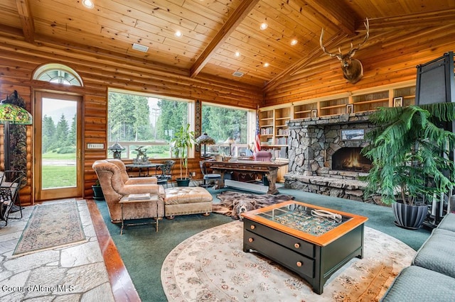 interior space with a fireplace, beam ceiling, high vaulted ceiling, and wood ceiling