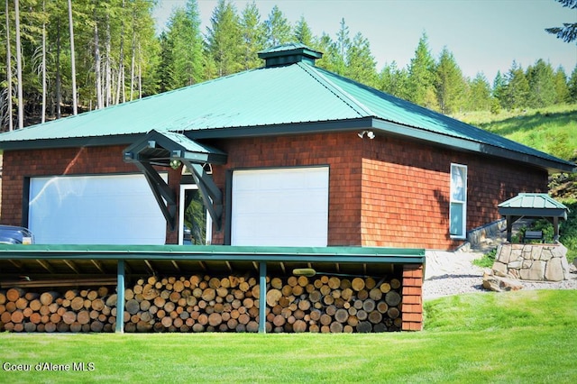 view of side of home featuring a yard