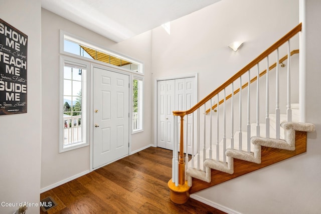 entrance foyer with hardwood / wood-style floors