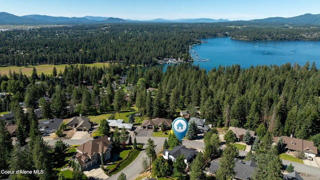 bird's eye view featuring a water and mountain view