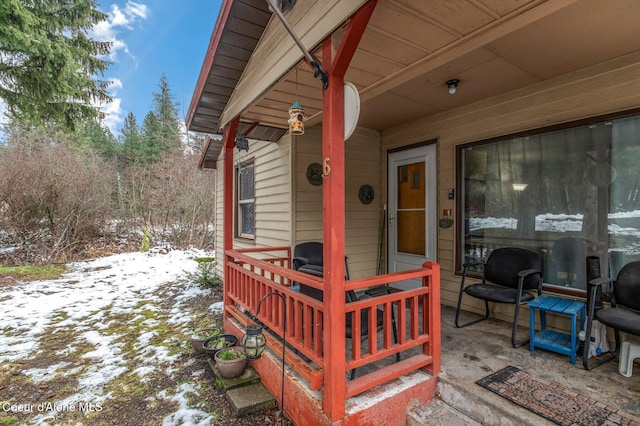 view of snow covered deck