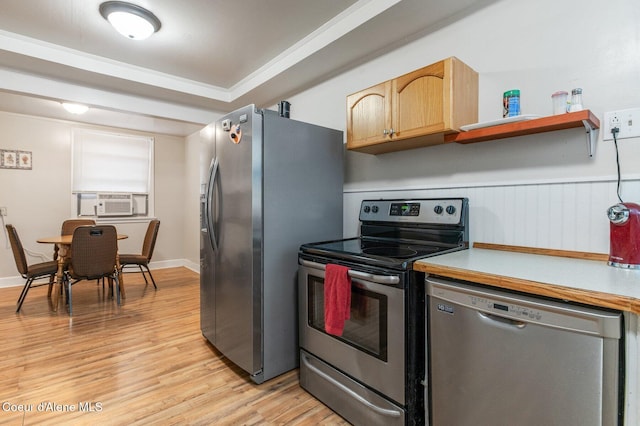 kitchen featuring light brown cabinetry, cooling unit, light hardwood / wood-style floors, and appliances with stainless steel finishes