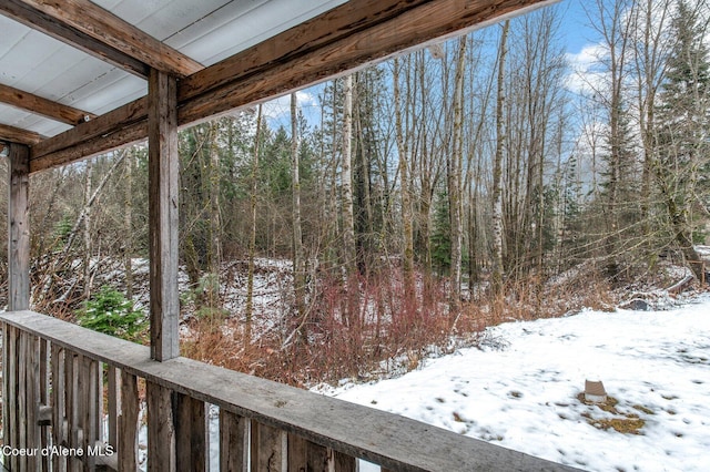 view of snow covered deck