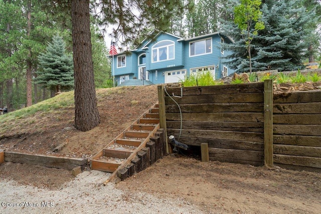 view of yard featuring a garage