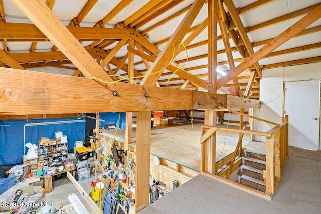 interior space with lofted ceiling with beams