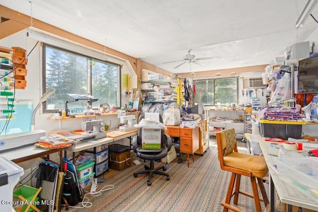 miscellaneous room featuring an AC wall unit, carpet flooring, and ceiling fan