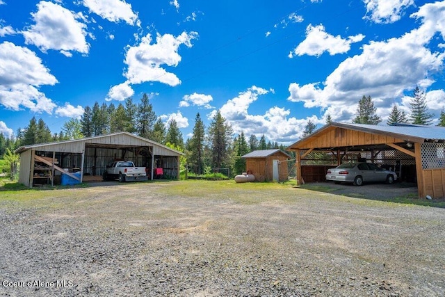 view of parking / parking lot with a carport