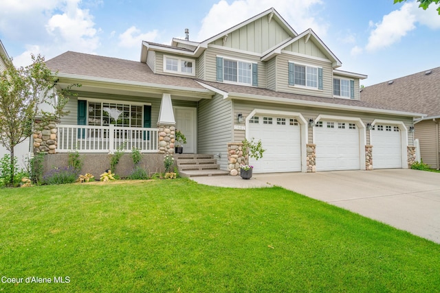 craftsman-style home featuring a garage, a porch, and a front lawn