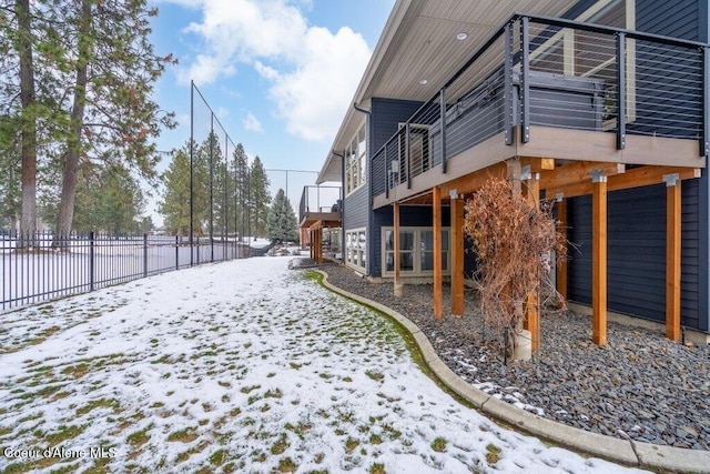 view of yard covered in snow