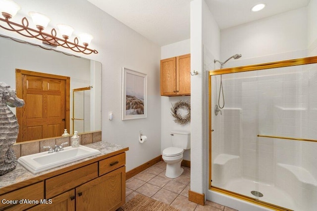 bathroom featuring toilet, tile patterned flooring, and a shower with shower door