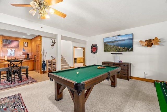 rec room featuring pool table, light colored carpet, and ceiling fan