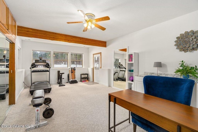 workout room with ceiling fan and light carpet