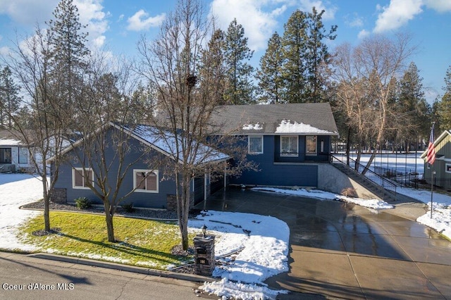 view of front of house with a yard