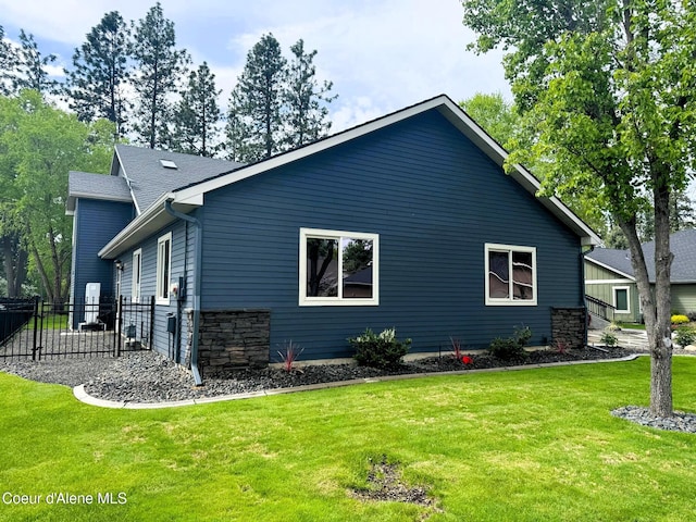 706 N Dundee Dr, Post Falls, ID 83854 - view of home's exterior with stone siding