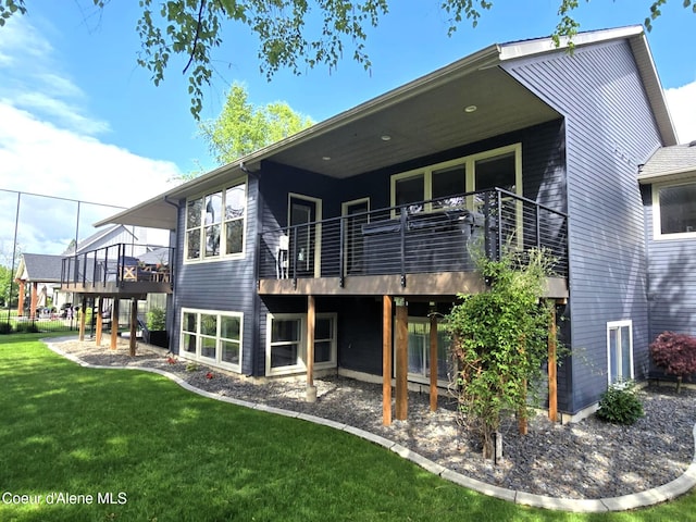 706 N Dundee Dr, Post Falls, ID 83854 - back of house with a yard and a deck