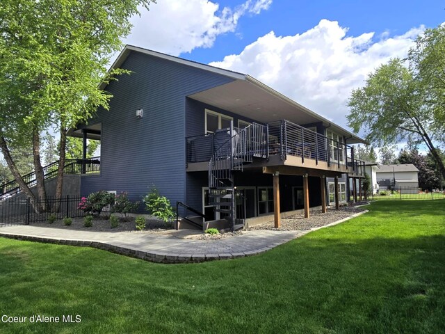 706 N Dundee Dr, Post Falls, ID 83854 - rear view of property with stairway and a deck