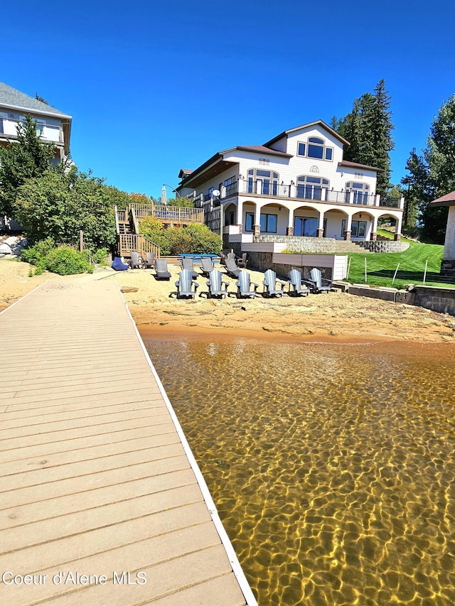 view of dock featuring a balcony