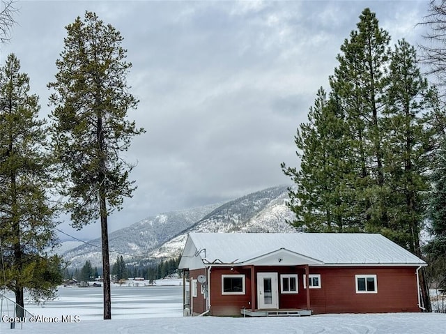 exterior space featuring a mountain view