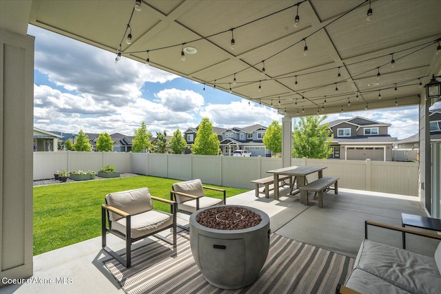 view of patio / terrace featuring a fire pit