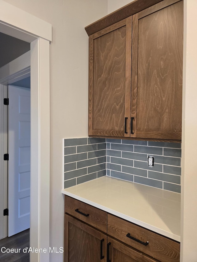 interior space featuring decorative backsplash