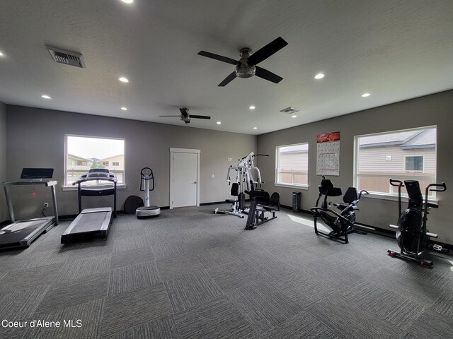 gym with carpet flooring, visible vents, and recessed lighting