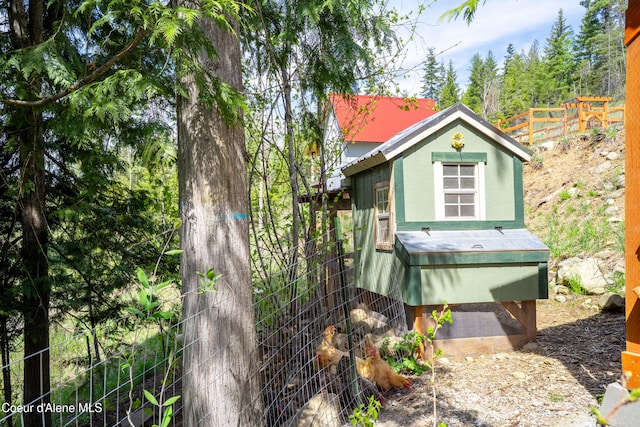 view of poultry coop with fence