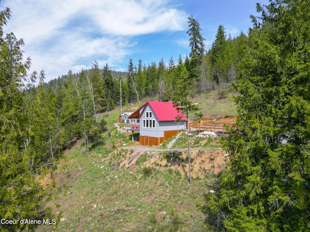 aerial view featuring a forest view