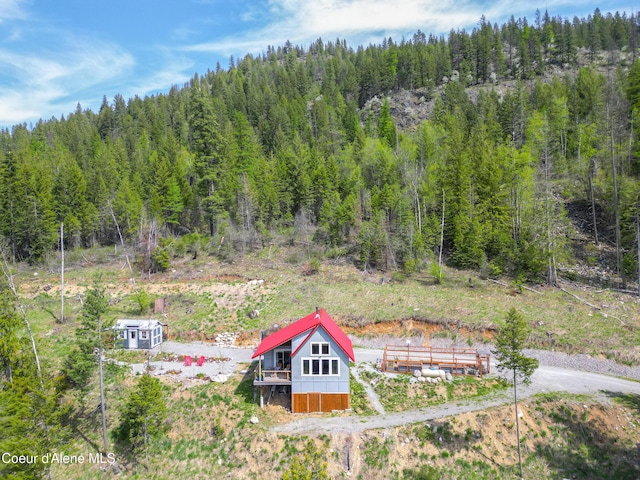 bird's eye view with a view of trees