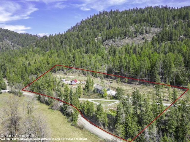 bird's eye view featuring a view of trees