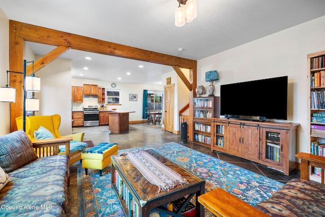 living room with beamed ceiling