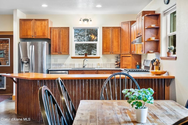 kitchen with appliances with stainless steel finishes and sink