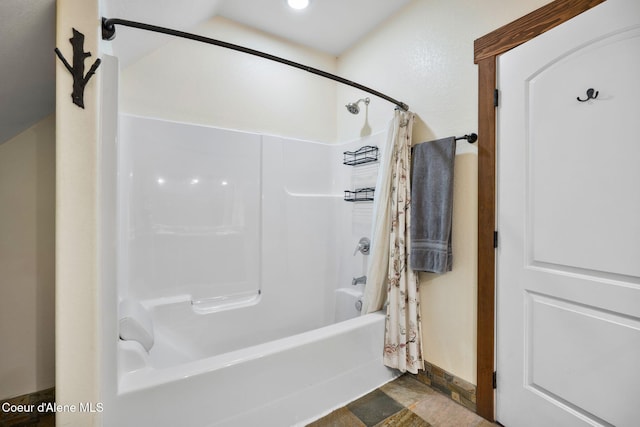 bathroom featuring shower / tub combo