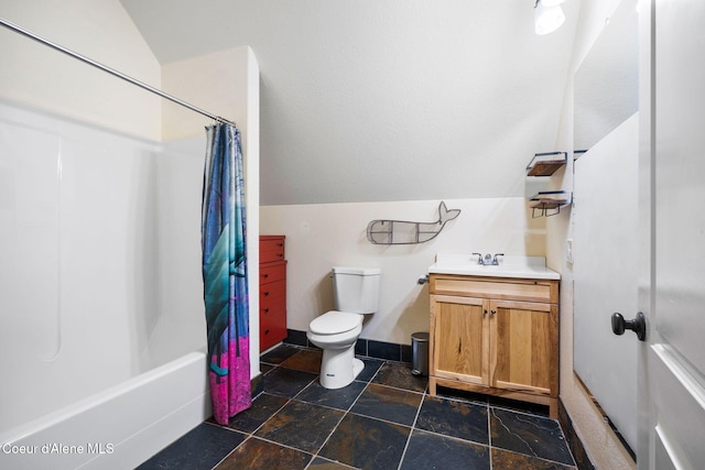 full bathroom with vanity, shower / tub combo, vaulted ceiling, and toilet