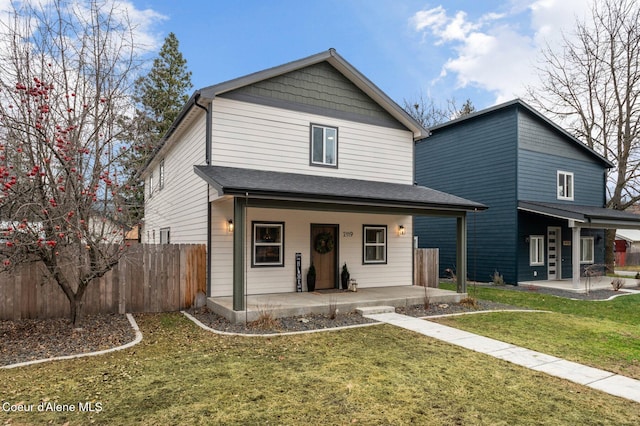 view of front of home with a front lawn