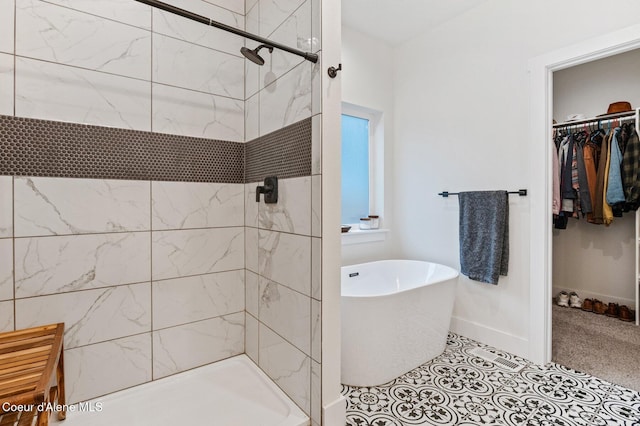 bathroom with tile patterned floors and plus walk in shower