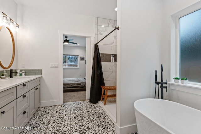 bathroom featuring separate shower and tub, ceiling fan, tile patterned flooring, and vanity