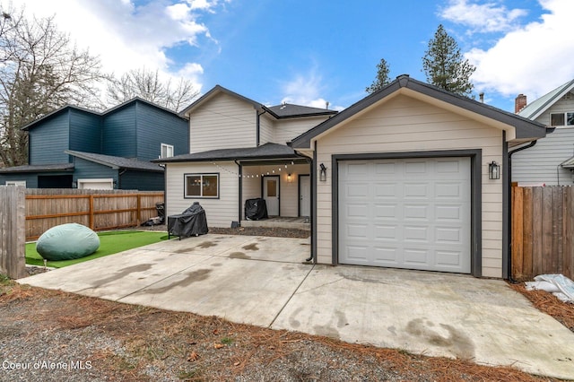 view of front of property featuring a garage