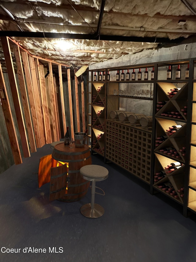 wine room featuring concrete floors