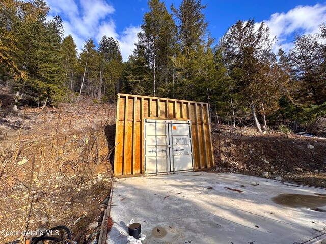 4333 Old Highway Two Loop, Moyie Springs, ID 83845 - garage featuring a forest view