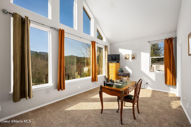 home office featuring carpet flooring, baseboards, and high vaulted ceiling