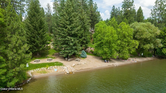 drone / aerial view with a water view