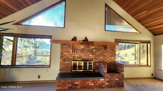 unfurnished living room featuring carpet floors, wooden ceiling, a fireplace, and lofted ceiling