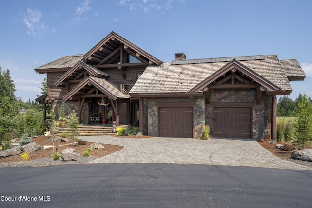 view of front of property featuring a garage