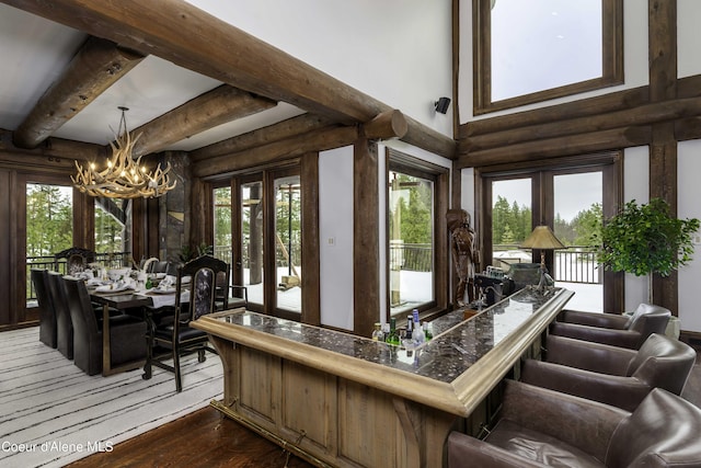 16692 S Lazurite Dr, Coeur Dalene, ID 83814 - sunroom with french doors, a wealth of natural light, and an inviting chandelier