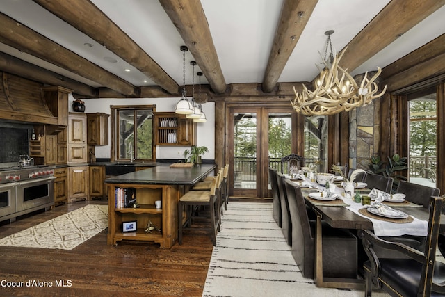 16692 S Lazurite Dr, Coeur Dalene, ID 83814 - dining room featuring beam ceiling, french doors, dark wood-type flooring, and an inviting chandelier