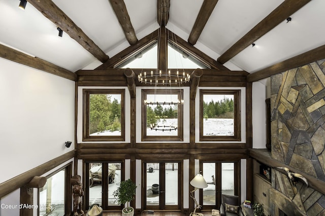 16692 S Lazurite Dr, Coeur Dalene, ID 83814 - interior space with beamed ceiling, a notable chandelier, and french doors