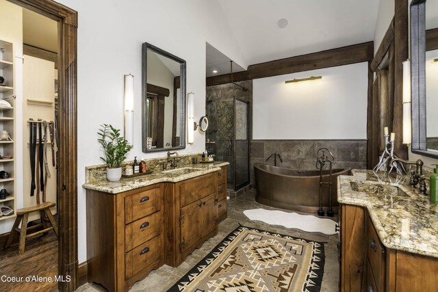 16692 S Lazurite Dr, Coeur Dalene, ID 83814 - bathroom with tile walls, vanity, independent shower and bath, and vaulted ceiling