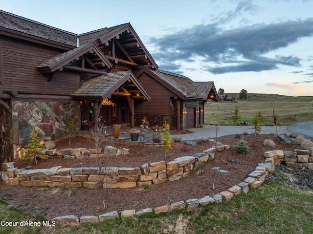 16692 S Lazurite Dr, Coeur Dalene, ID 83814 - exterior space featuring a garage
