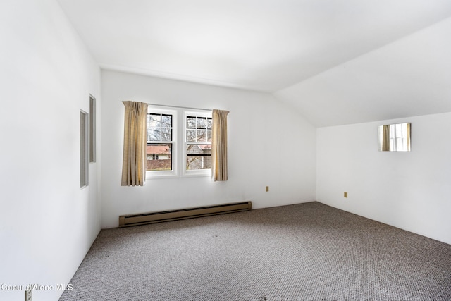 additional living space featuring carpet flooring, lofted ceiling, and baseboard heating