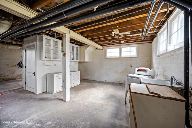 basement with washer / dryer